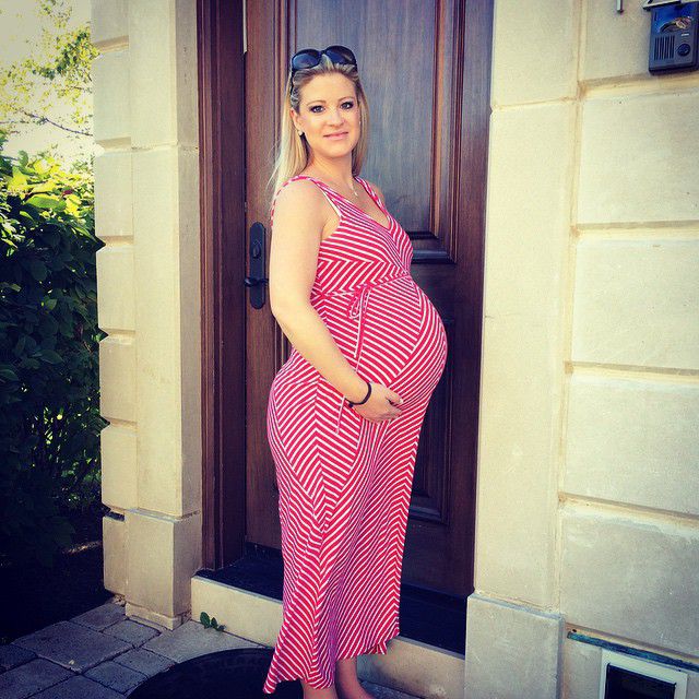 My beautiful wife @krissmith14 39 and1/2 weeks pregnant. I can't wait ...