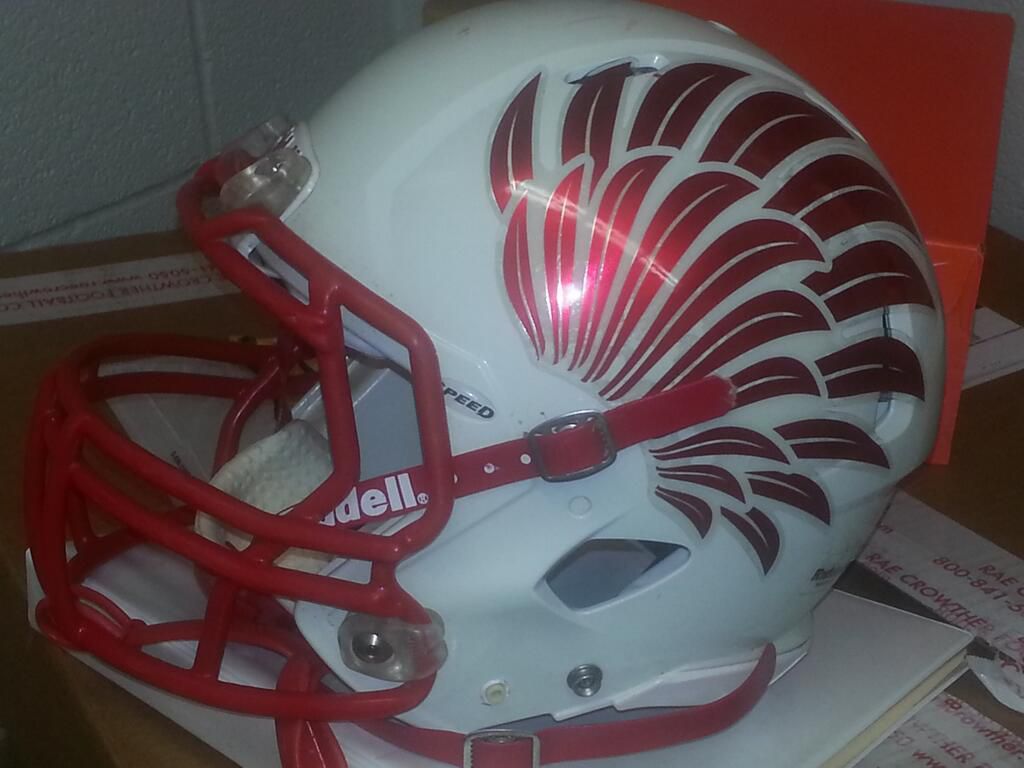 Mt. Zion High School (IL) new football helmets. (via jshu76)