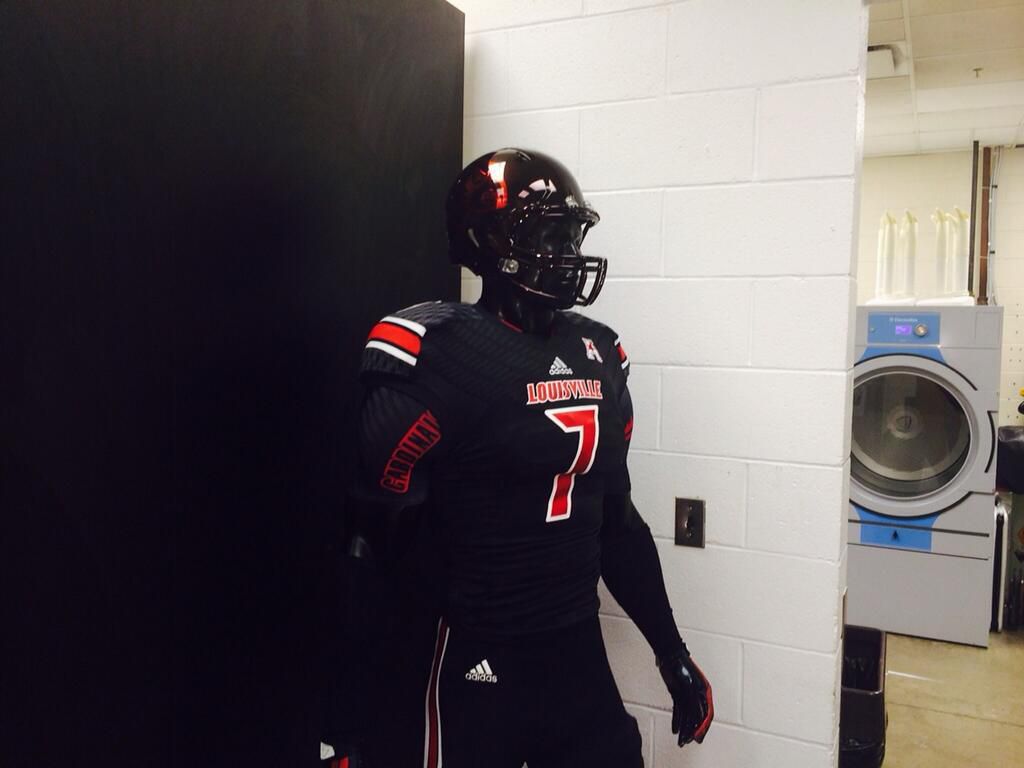 Louisville's new all black football helmets and uniforms.