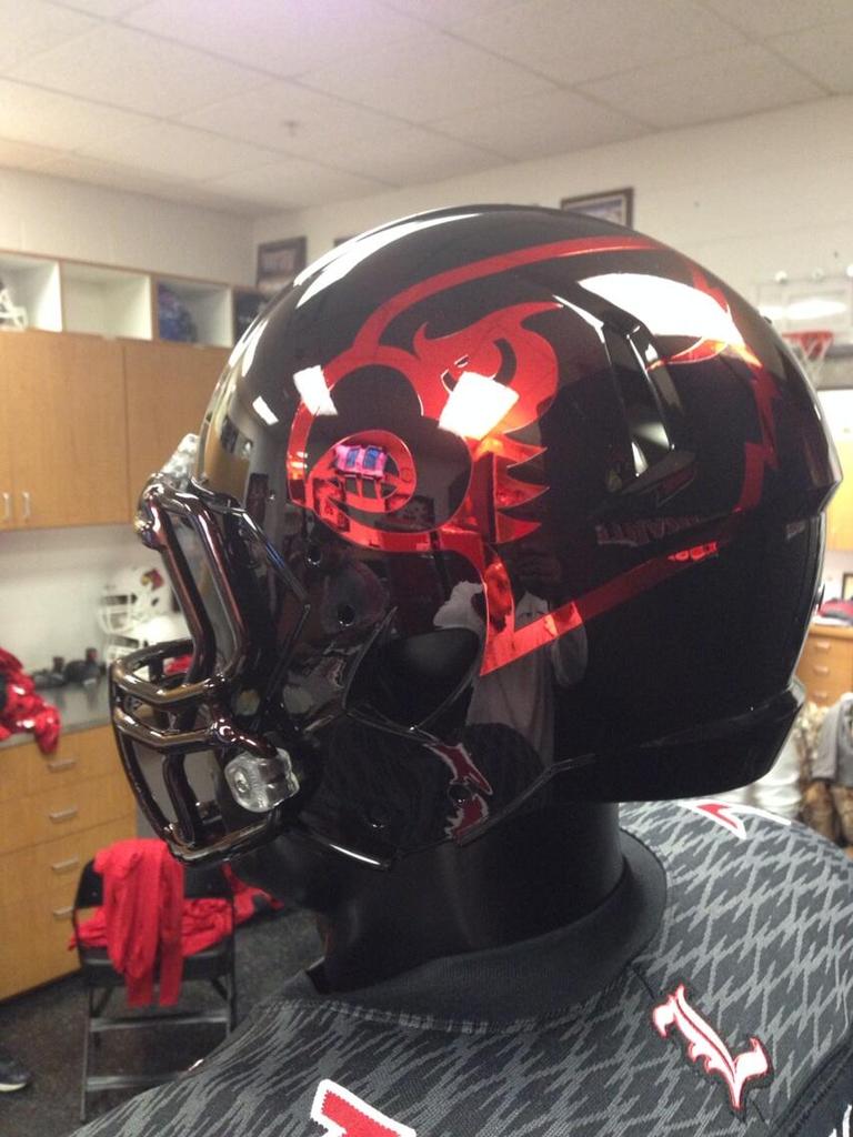Louisville's black and red chrome football helmets.